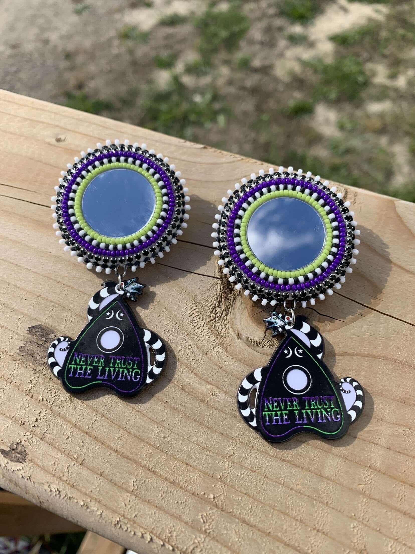 Earrings with Beetlejuice design
